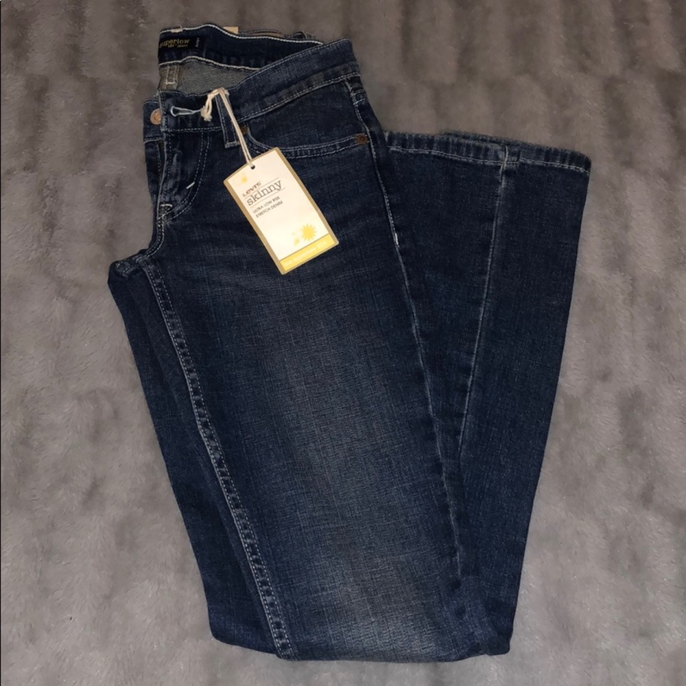 New medium wash 524 Levi jeans.